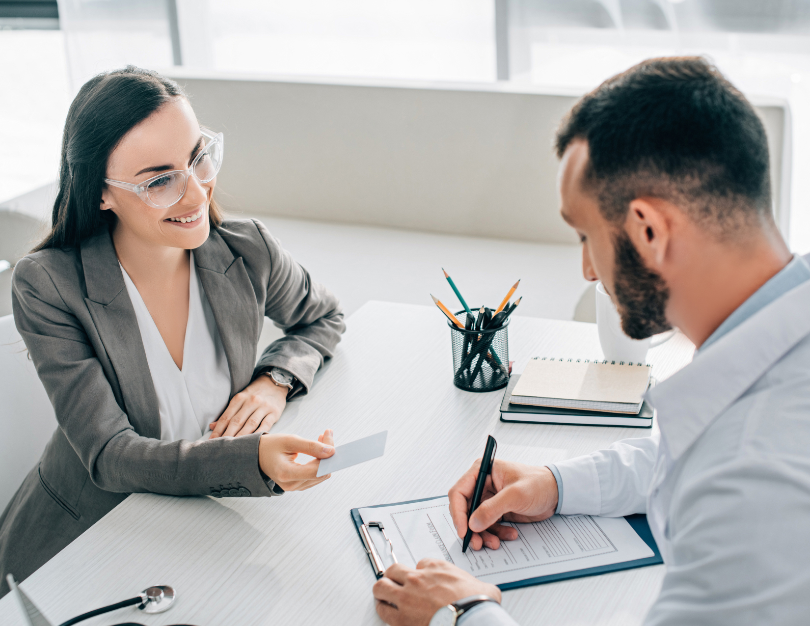 Insurance agent helping couple